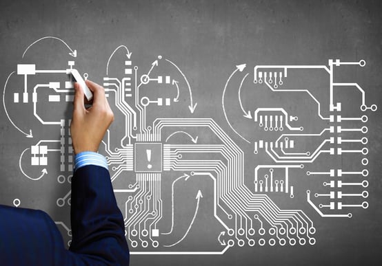 Close up image human hand drawing circuit board.jpeg